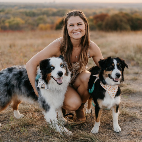 Dr. Deeb's bio pic with herself and two lovely dogs